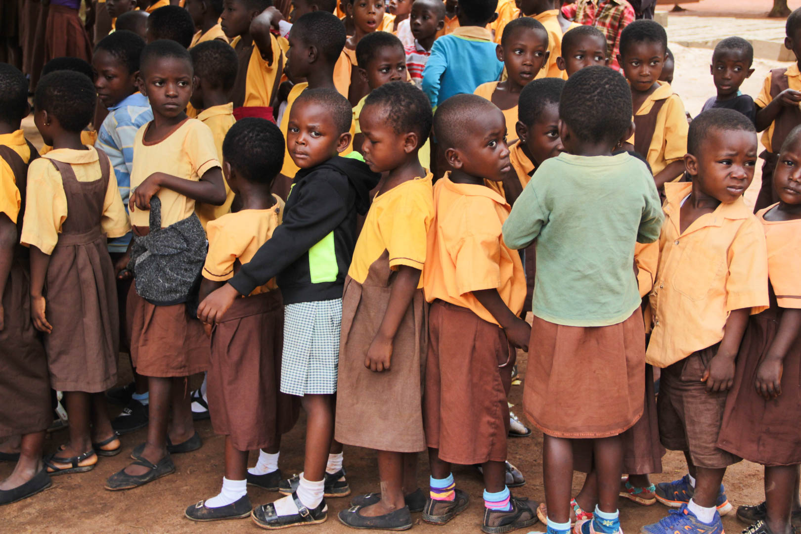 A rare picture of kids parading for charity items- courtesy smileatschool